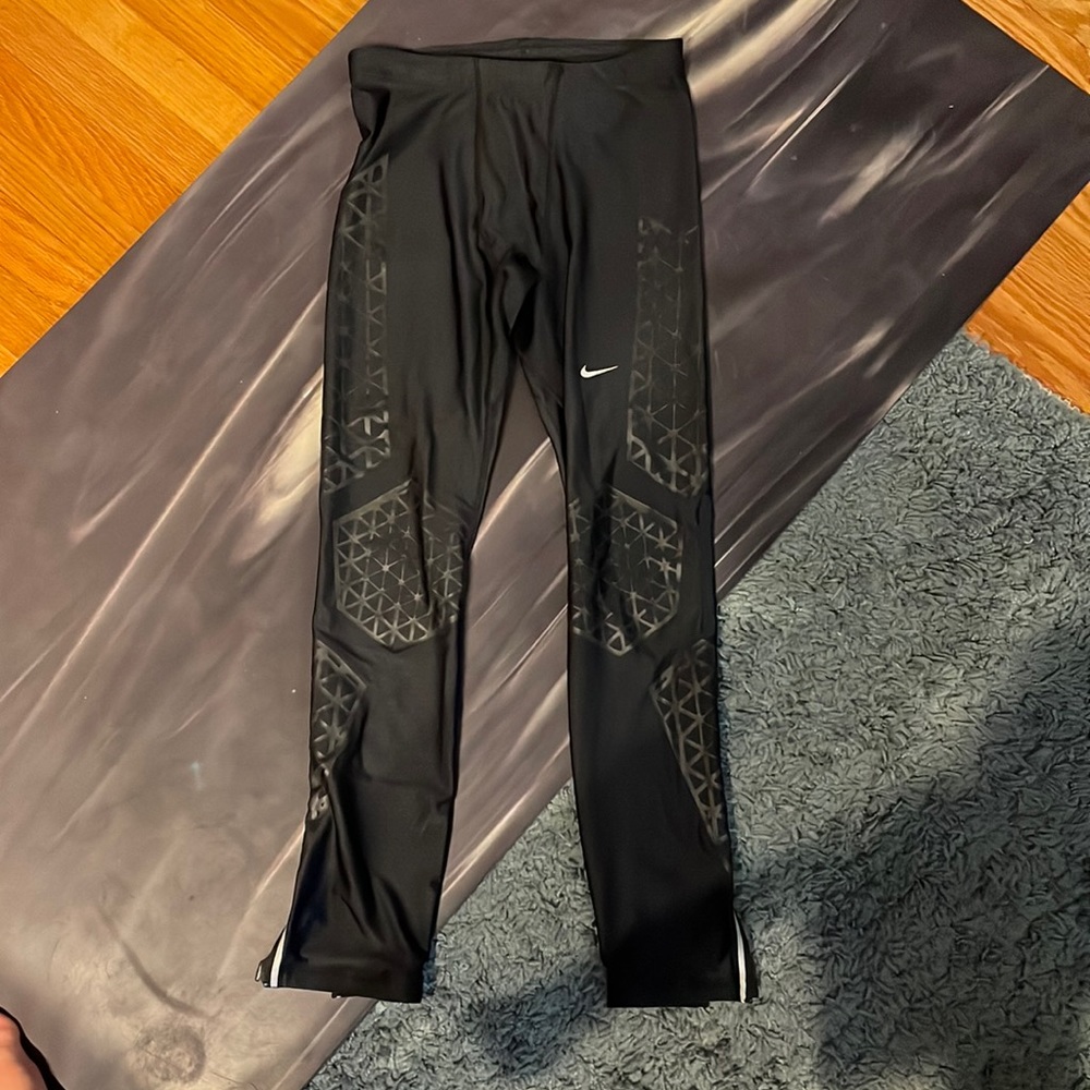 Gently used Nike mens running tights